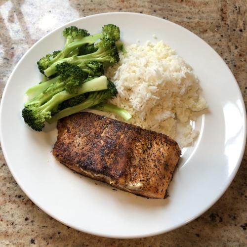 Blackened salmon with broccoli and rice